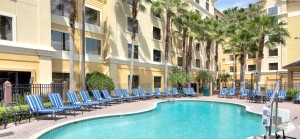 Poolside Relaxation is a favorite pastime at staysky Suites I-Drive Orlando